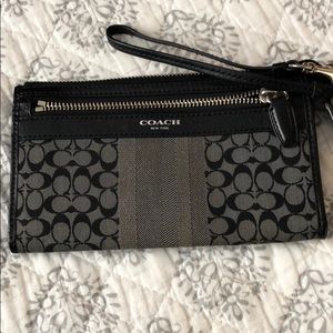 Black and silver/gray Coach Wristlet